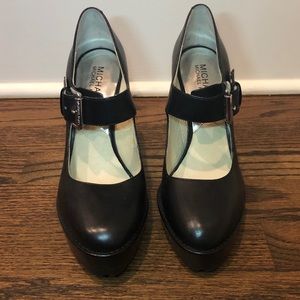 Michael Kors Platform with a Silver buckle